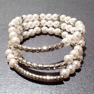C 1946 Signed White Faux Pearl and Silver Tone Triple Strand Stretch Bracelet